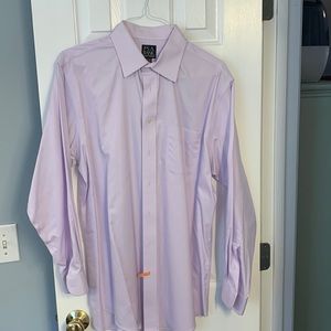 Men’s LS dress shirt. Purple with spare buttons. Rarely worn and looks great!